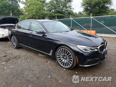 Czwarte zdjęcie samochodu z boku: 2018 BMW 750 I VIN:WBA7F0C55JGM24039 - miniatura