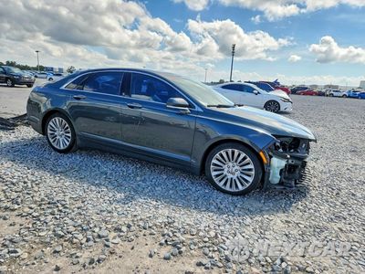 Czwarte zdjęcie samochodu z boku: 2015 LINCOLN MKZ VIN:3LN6L2G94FR622042 - miniatura
