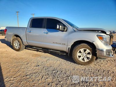 Czwarte zdjęcie samochodu z boku: 2018 NISSAN TITAN SV VIN:1N6AA1E54JN507805 - miniatura