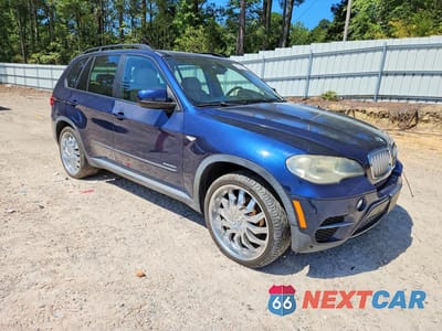 Czwarte zdjęcie samochodu z boku: 2012 BMW X5 XDRIVE50I VIN:5UXZV8C54CL424006 - miniatura