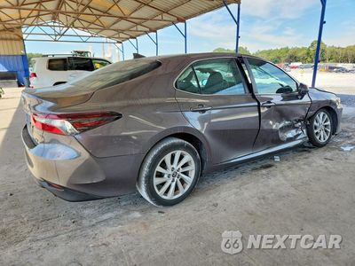 Trzecie zdjęcie samochodu z tyłu: 2022 TOYOTA CAMRY LE VIN:4T1C11AK7NU676425 - miniatura