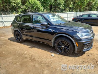 Czwarte zdjęcie samochodu z boku: 2019 VOLKSWAGEN TIGUAN SE VIN:3VV3B7AX3KM143747 - miniatura