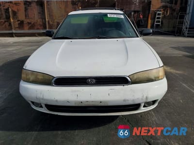 Piąte zdjęcie samochodu w środku: 1995 SUBARU LEGACY L VIN:4S3BK6354S7343014 - miniatura