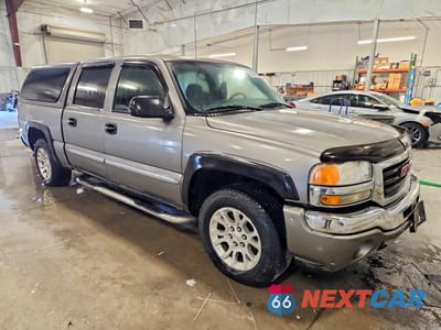 Czwarte zdjęcie samochodu z boku: 2006 GMC NEW SIERRA K1500 VIN:2GTEK13T361242631 - miniatura
