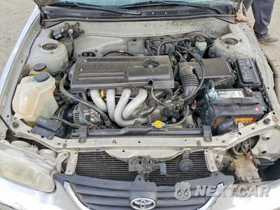 Zdjęcie 11 z 12 samochodu: 2001 TOYOTA COROLLA CE VIN:1NXBR12E31Z426901 - miniatura