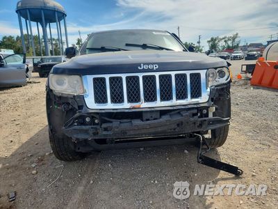 Piąte zdjęcie samochodu w środku: 2013 JEEP GRAND CHEROKEE OVERLAND VIN:1C4RJFCG1DC627035 - miniatura