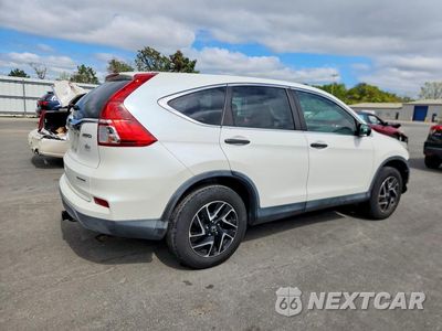 Trzecie zdjęcie samochodu z tyłu: 2016 HONDA CR-V SE VIN:5J6RM4H44GL085955 - miniatura