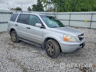 Czwarte zdjęcie samochodu z boku: 2004 HONDA PILOT EX VIN:2HKYF18434H533273 - miniatura