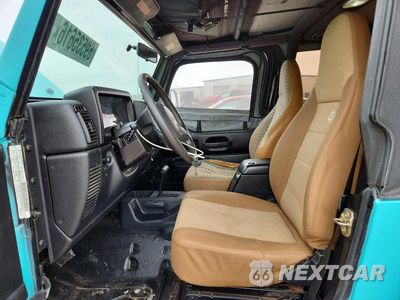 Zdjęcie 7 z 13 samochodu: 1997 JEEP WRANGLER / TJ SPORT VIN:1J4FY19S3VP521851 - miniatura