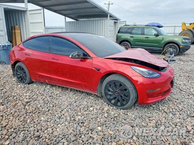 Czwarte zdjęcie samochodu z boku: 2022 TESLA MODEL 3 VIN:5YJ3E1EBXNF228174 - miniatura
