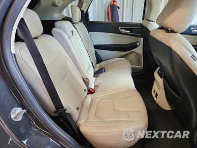 Zdjęcie 11 z 13 samochodu: 2021 FORD EDGE TITANIUM VIN:2FMPK4K99MBA27290 - miniatura