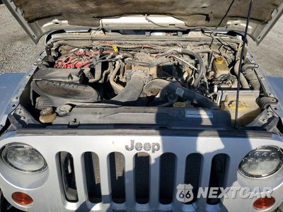 Zdjęcie 12 z 13 samochodu: 2011 JEEP WRANGLER UNLIMITED RUBICON VIN:1J4BA6H15BL585238 - miniatura