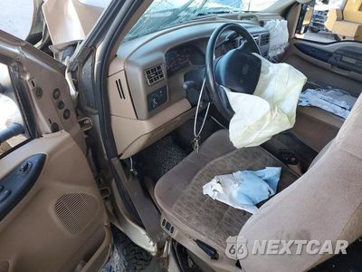 Zdjęcie 8 z 12 samochodu: 1999 FORD F250 SUPER DUTY VIN:1FTNX21F3XEA59279 - miniatura