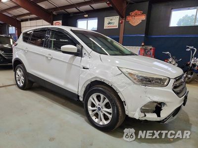 Czwarte zdjęcie samochodu z boku: 2017 FORD ESCAPE SE VIN:1FMCU9GD6HUE00546 - miniatura