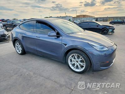 Czwarte zdjęcie samochodu z boku: 2023 TESLA MODEL Y VIN:7SAYGDEE4PA103735 - miniatura