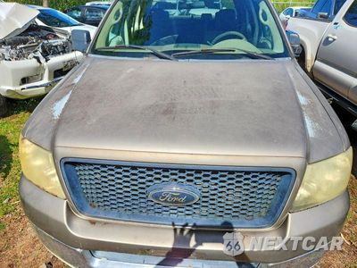 Zdjęcie 11 z 12 samochodu: 2004 FORD F150 SUPERCREW VIN:1FTRW12W24KD10349 - miniatura