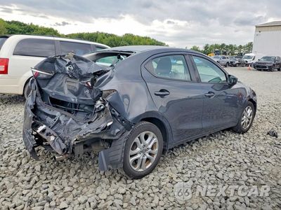 Trzecie zdjęcie samochodu z tyłu: 2017 TOYOTA YARIS IA BASE VIN:3MYDLBYVXHY181843 - miniatura
