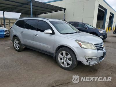 Czwarte zdjęcie samochodu z boku: 2016 CHEVROLET TRAVERSE LT VIN:1GNKVGKD6GJ177229 - miniatura