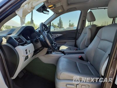 Zdjęcie 7 z 13 samochodu: 2022 HONDA PILOT TOURING VIN:5FNYF5H94NB003591 - miniatura