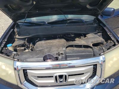 Zdjęcie 12 z 14 samochodu: 2010 HONDA PILOT EXL VIN:5FNYF3H54AB020368 - miniatura