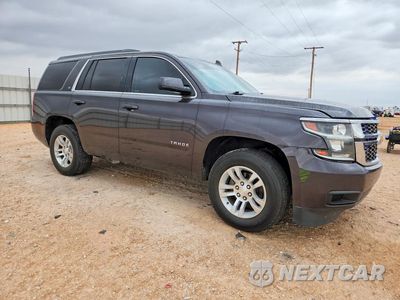 Czwarte zdjęcie samochodu z boku: 2018 CHEVROLET TAHOE K1500 LT VIN:1GNSKBKCXJR341433 - miniatura
