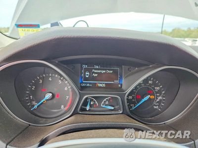 Zdjęcie 9 z 13 samochodu: 2017 FORD FOCUS SEL VIN:1FADP3M28HL207570 - miniatura
