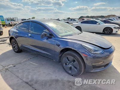 Czwarte zdjęcie samochodu z boku: 2023 TESLA MODEL 3 VIN:5YJ3E1EAXPF705731 - miniatura