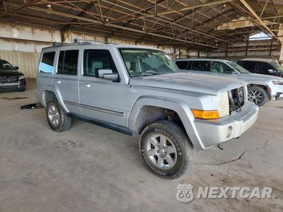 Czwarte zdjęcie samochodu z boku: 2007 JEEP COMMANDER LIMITED VIN:1J8HG58287C587177 - miniatura
