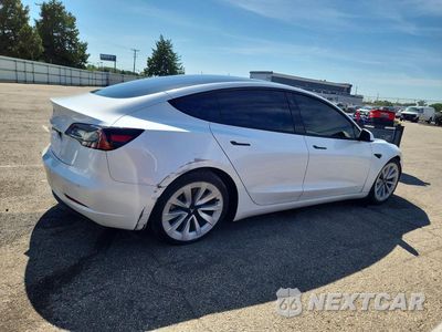 Trzecie zdjęcie samochodu z tyłu: 2021 TESLA MODEL 3 VIN:5YJ3E1EA6MF052875 - miniatura