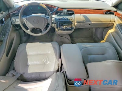 Zdjęcie 8 z 12 samochodu: 2003 CADILLAC DEVILLE VIN:1G6KD54Y13U171947 - miniatura