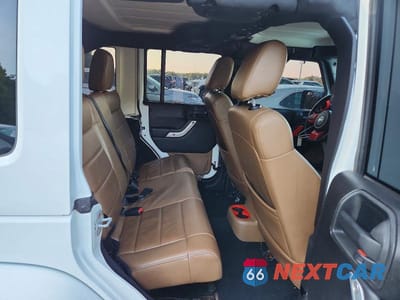 Zdjęcie 11 z 13 samochodu: 2011 JEEP WRANGLER UNLIMITED SAHARA VIN:1J4BA5H19BL563480 - miniatura