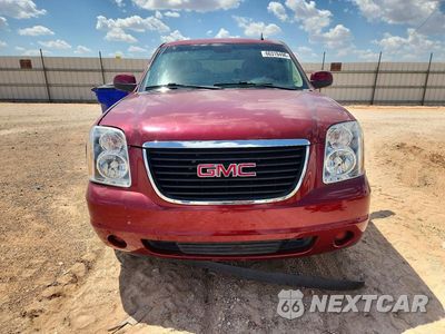 Piąte zdjęcie samochodu w środku: 2011 GMC YUKON SLE VIN:1GKS1AE01BR273925 - miniatura