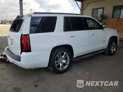 Trzecie zdjęcie samochodu z tyłu: 2019 CHEVROLET TAHOE C1500 LT VIN:1GNSCBKC9KR156496 - miniatura
