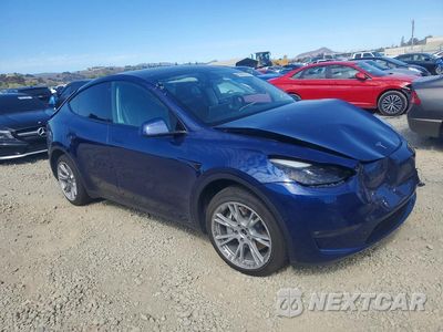 Czwarte zdjęcie samochodu z boku: 2022 TESLA MODEL Y VIN:7SAYGDEE8NF543375 - miniatura