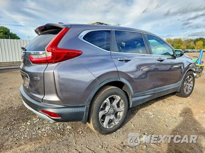 Trzecie zdjęcie samochodu z tyłu: 2018 HONDA CR-V EX VIN:7FARW2H51JE060698 - miniatura