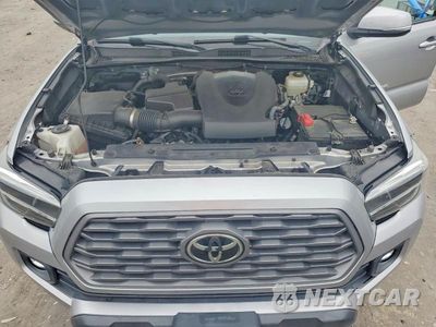 Zdjęcie 11 z 12 samochodu: 2021 TOYOTA TACOMA TRD OFF-ROAD VIN:3TYCZ5AN1MT037561 - miniatura