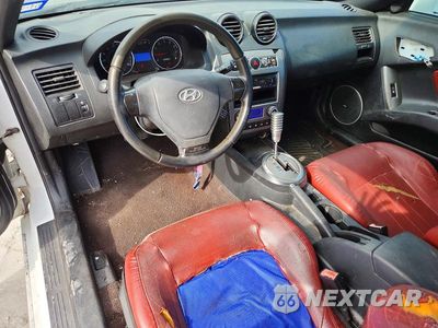 Zdjęcie 8 z 12 samochodu: 2007 HYUNDAI TIBURON GT VIN:KMHHN66F17U255483 - miniatura