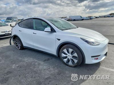 Czwarte zdjęcie samochodu z boku: 2024 TESLA MODEL Y VIN:7SAYGDEE5RF989036 - miniatura