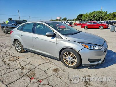 Czwarte zdjęcie samochodu z boku: 2017 FORD FOCUS SE VIN:1FADP3F26HL341278 - miniatura