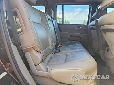 Zdjęcie 11 z 13 samochodu: 2013 HONDA PILOT EXL VIN:5FNYF3H53DB022066 - miniatura