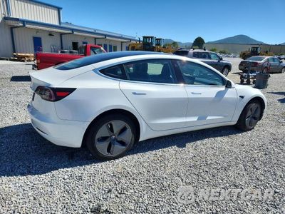 Trzecie zdjęcie samochodu z tyłu: 2020 TESLA MODEL 3 VIN:5YJ3E1EA3LF504277 - miniatura