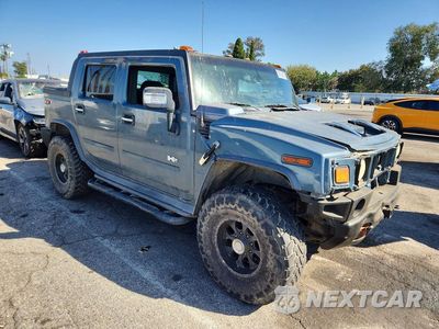 Czwarte zdjęcie samochodu z boku: 2005 HUMMER H2 SUT VIN:5GRGN22U45H107779 - miniatura