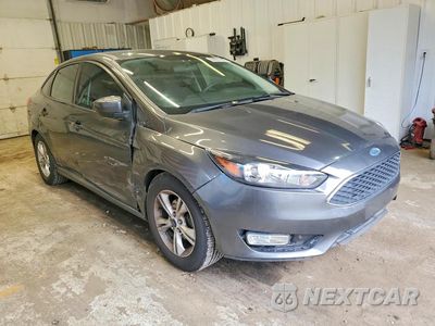 Czwarte zdjęcie samochodu z boku: 2018 FORD FOCUS SE VIN:1FADP3F21JL321882 - miniatura