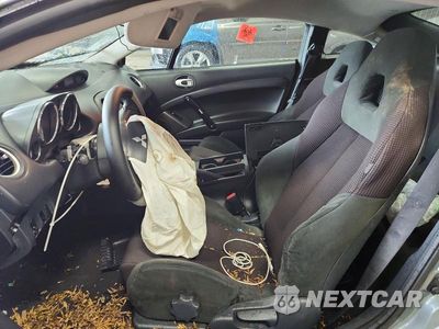 Zdjęcie 7 z 13 samochodu: 2009 MITSUBISHI ECLIPSE GS VIN:4A3AK24F99E009365 - miniatura