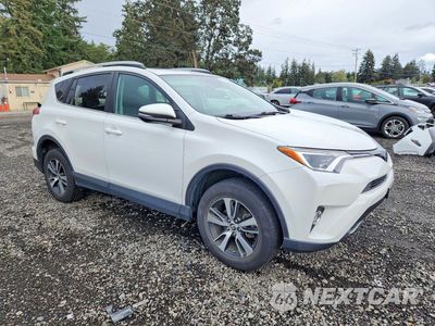 Czwarte zdjęcie samochodu z boku: 2018 TOYOTA RAV4 XLE VIN:2T3RFREV3JW801050 - miniatura