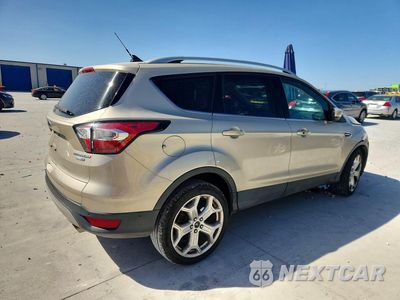 Trzecie zdjęcie samochodu z tyłu: 2018 FORD ESCAPE TITANIUM VIN:1FMCU9J99JUC05843 - miniatura