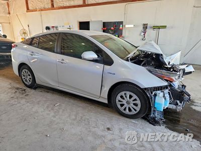 Czwarte zdjęcie samochodu z boku: 2021 TOYOTA PRIUS L ECO VIN:JTDKAMFU4M3146560 - miniatura