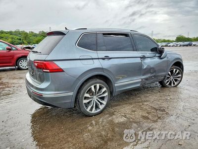 Trzecie zdjęcie samochodu z tyłu: 2021 VOLKSWAGEN TIGUAN SEL PREMIUM R-LINE VIN:3VV4B7AX8MM158039 - miniatura