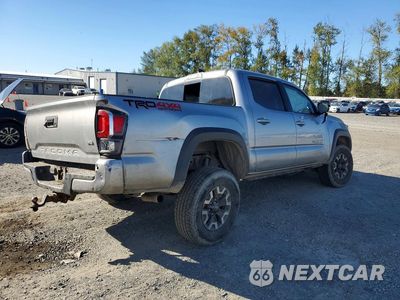 Trzecie zdjęcie samochodu z tyłu: 2020 TOYOTA TACOMA TRD OFF-ROAD VIN:3TMCZ5AN1LM292401 - miniatura