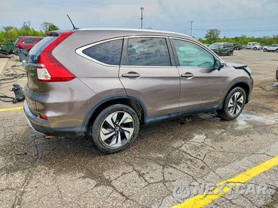 Trzecie zdjęcie samochodu z tyłu: 2016 HONDA CR-V TOURING VIN:5J6RM4H97GL039399 - miniatura